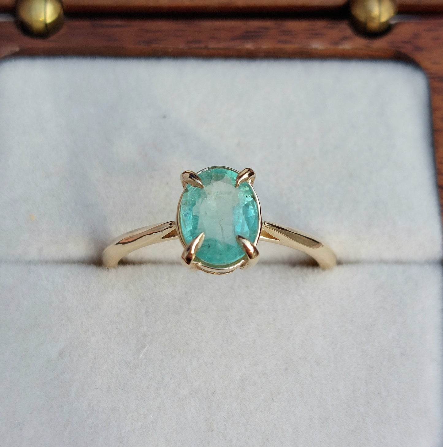 Verity - 8x6mm Colombian emerald set in 9ct yellow gold (Size O)