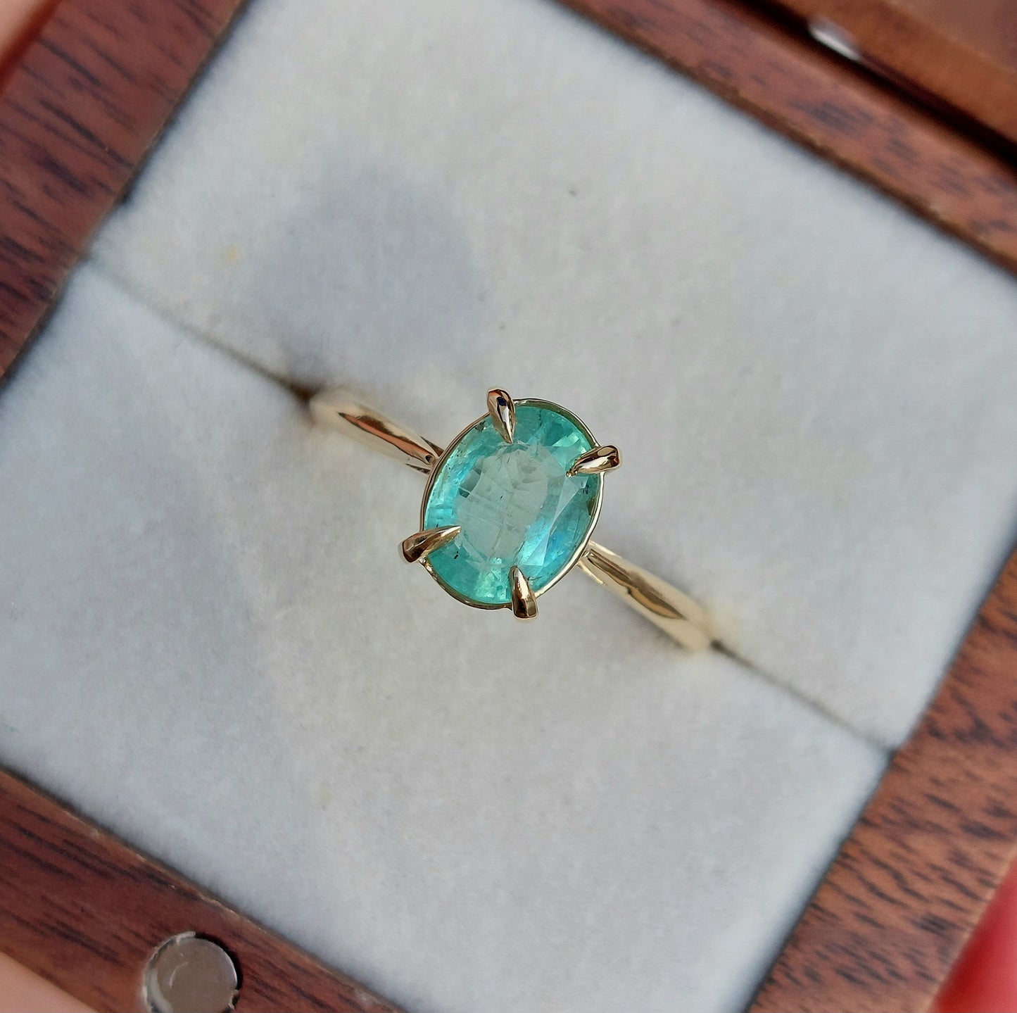 Verity - 8x6mm Colombian emerald set in 9ct yellow gold (Size O)