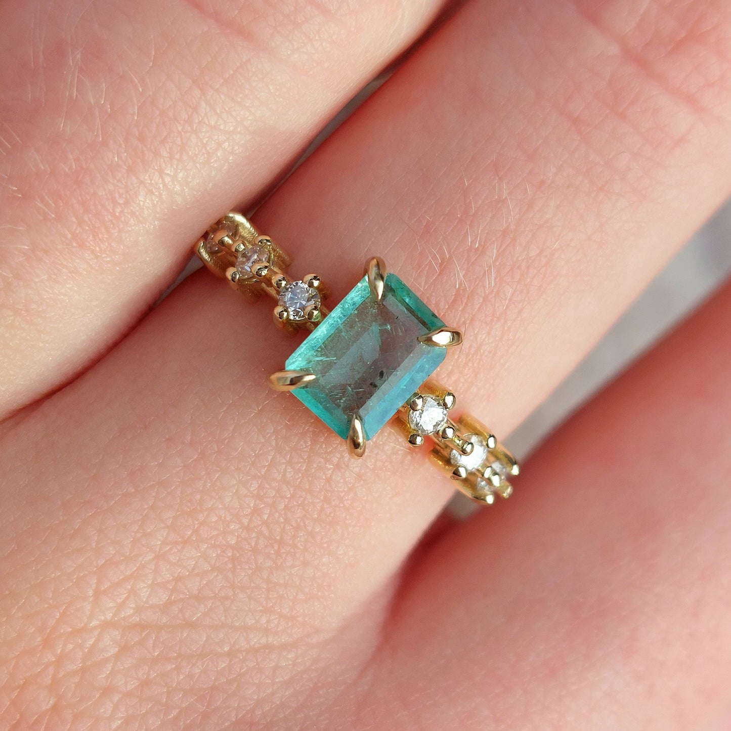 Esmerelda - 7x5mm Colombian emerald set in 9ct yellow gold (Size O)