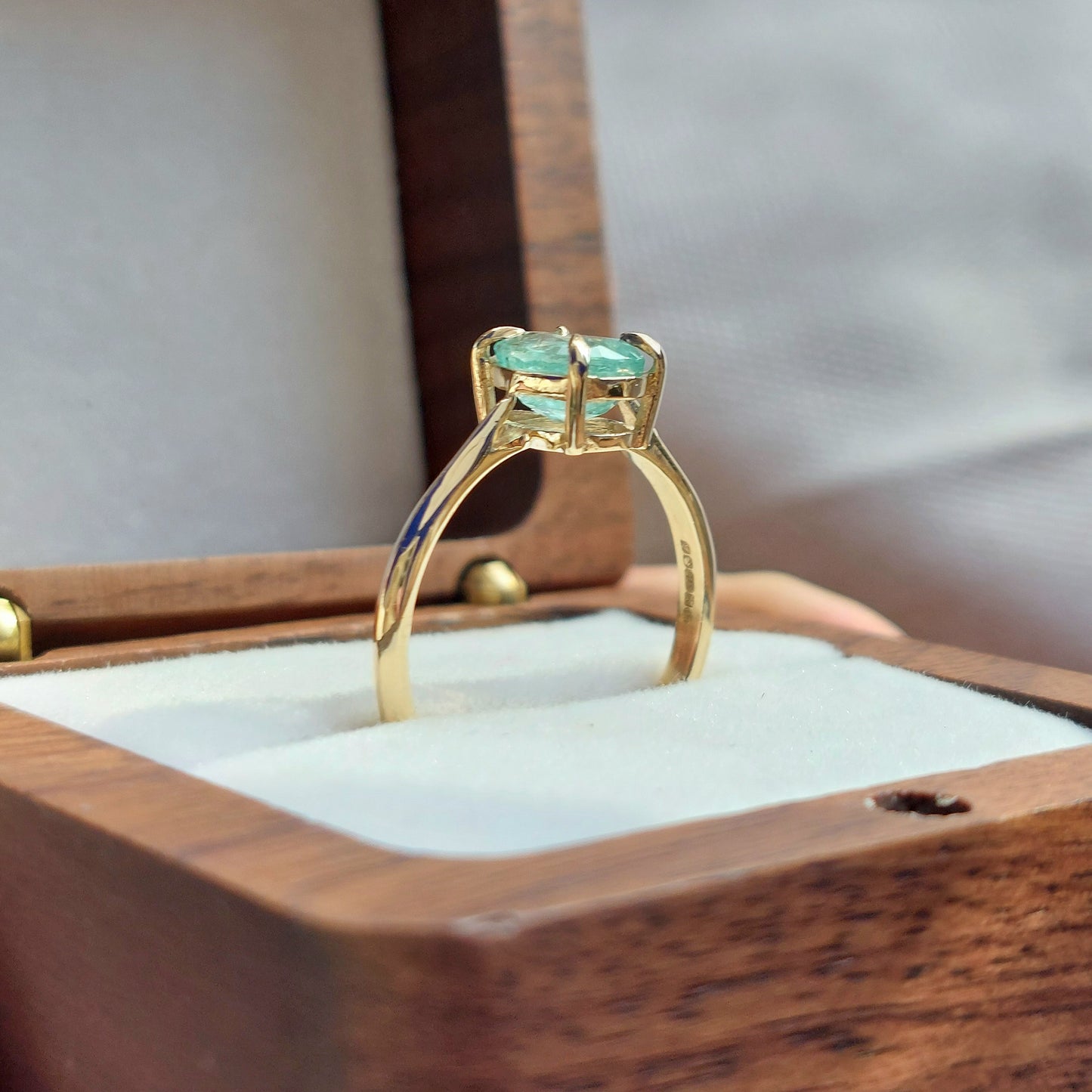 Verity - 8x6mm Colombian emerald set in 9ct yellow gold (Size O)